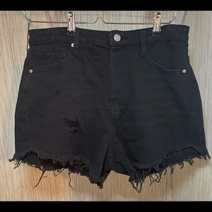 Black ripped denim shorts